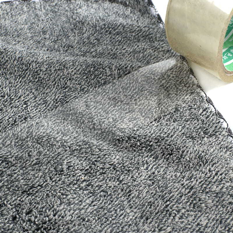 How to prevent lint or fibers from car wash towels from sticking to the vehicle surface during the drying process?